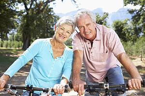 Senior couple on country bike ride