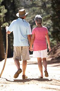 Senior couple on country walk