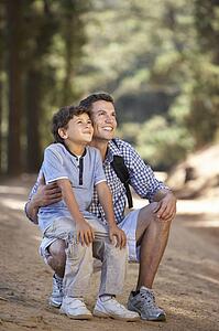 Father and son on country walk