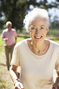 Senior couple on country run
