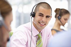 Young businessman wearing headset