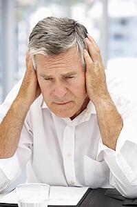 Unhappy senior businessman