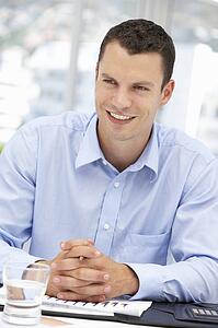 Young businessman at desk