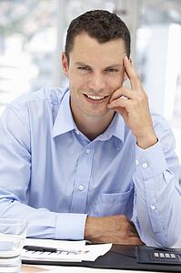 Young businessman at desk