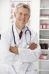 Senior doctor in consulting room