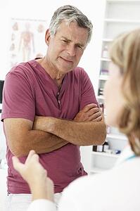 Senior man visiting doctor