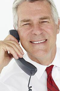 Senior businessman on phone