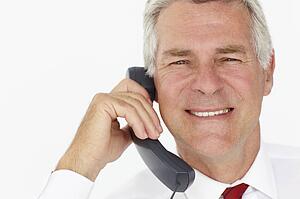 Senior businessman on phone