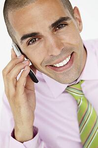 Young businessman using cellphone