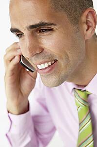 Young businessman using cellphone