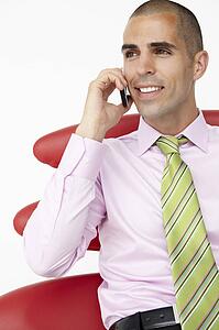 Young businessman using cellphone