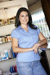 Woman working in hairdressing salon