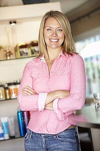 Woman working in hairdressing salon