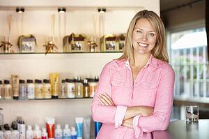 Woman working in hairdressing salon