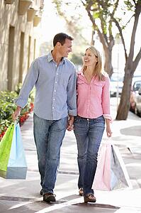 Couple carrying shopping