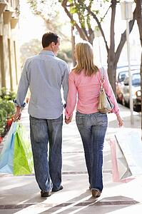 Couple carrying shopping