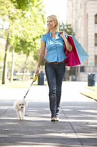Woman on shopping trip with dog