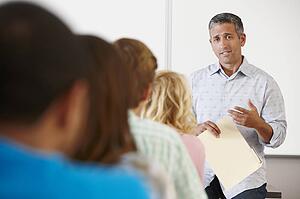 Tutor with class of students