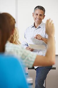 Tutor with class of students