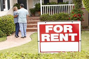Senior Hispanic couple renting new home