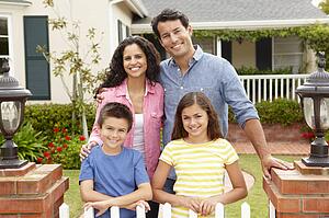 Hispanic family outside home