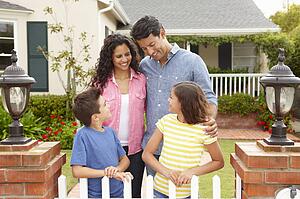 Hispanic family outside home