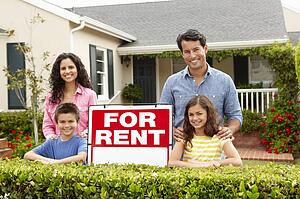 Hispanic family outside home for rent