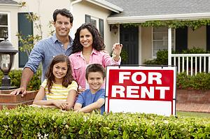 Hispanic family outside home for rent