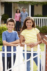 Hispanic family outside home
