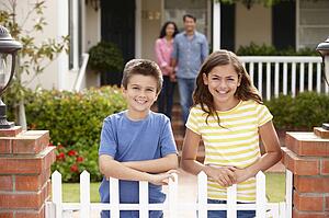 Hispanic family outside home