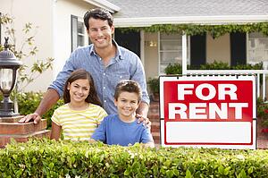 Father and children outside home for rent