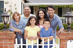 Hispanic family outside home