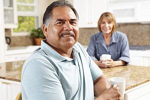 Senior couple relaxing in kitchen