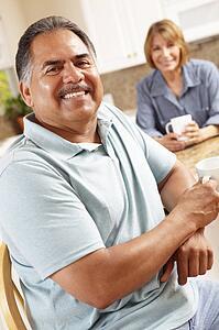 Senior couple relaxing in kitchen