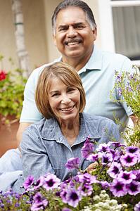 Senior couple relaxing in garden