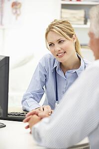 Young doctor with senior patient