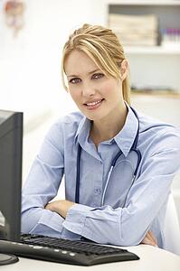 Young doctor at desk