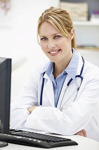 Young doctor at desk