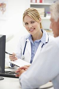 Young doctor with senior patient