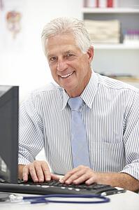 Senior doctor at desk