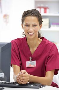 Young hospital doctor at desk