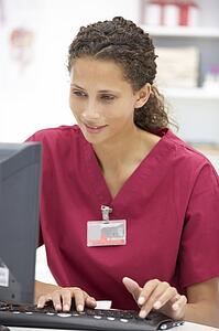Young hospital doctor at desk
