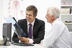 Doctor with senior patient