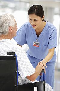 Senior patient with young doctor