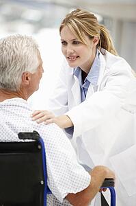 Senior patient with young doctor