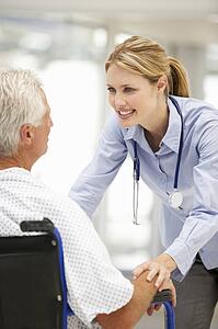 Senior patient with young doctor