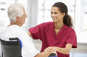 Senior patient with young doctor