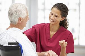 Senior patient with young doctor