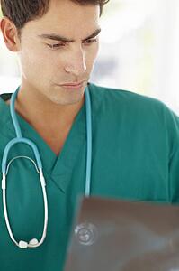 Young male doctor with x-ray