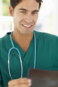 Young male doctor with x-ray